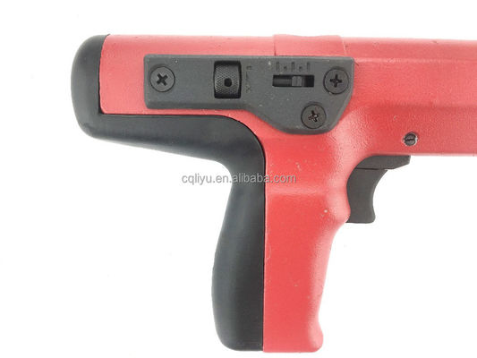 Pistola da chiodo decorativa per tappezzeria rossa con cariche di polvere a strisce e chiodi di cemento durevoli