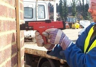 Pistola a chiodi senza fili a polvere DX-450 di grado professionale con fonte di alimentazione manuale