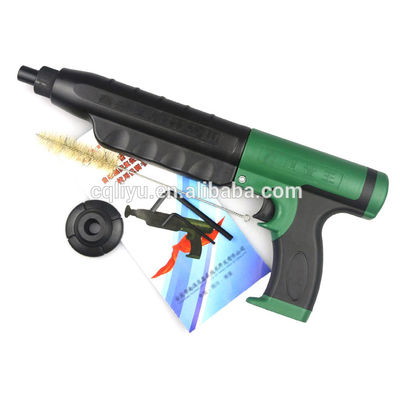 Dispositivo di tiro a scatto automatico in metallo Dispositivo di fissaggio a chiodi in verde e nero
